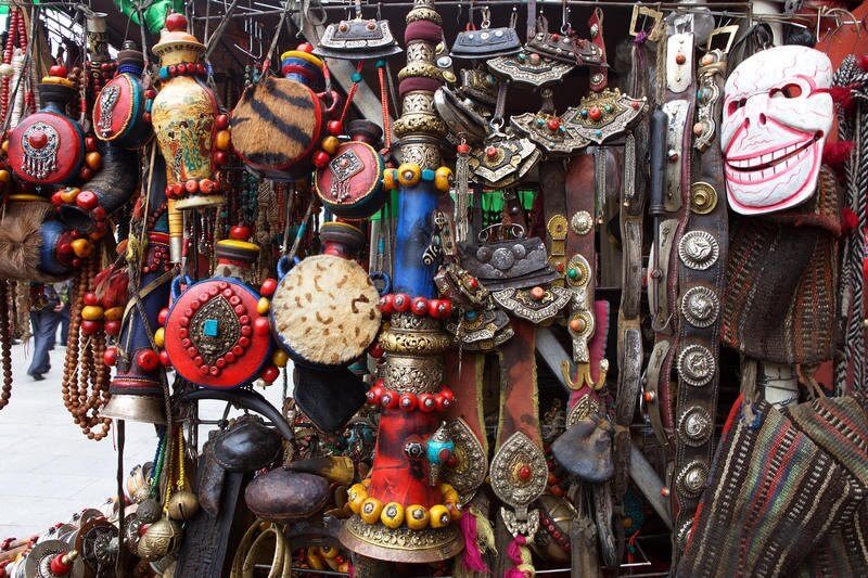 Masks and ornaments at a Barkhor Street stall, Lhasa
