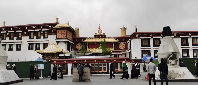 Pilgrims in front of the Jokhang Temple, Lhasa