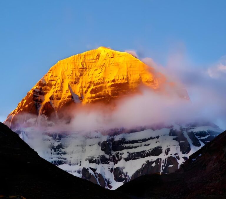 Mount Kailash glowing gold at sunrise