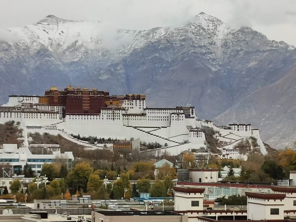 Potala Palace with snow on the hills behind