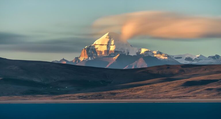 Mount Kailash above Lake Manasarovar at dawn