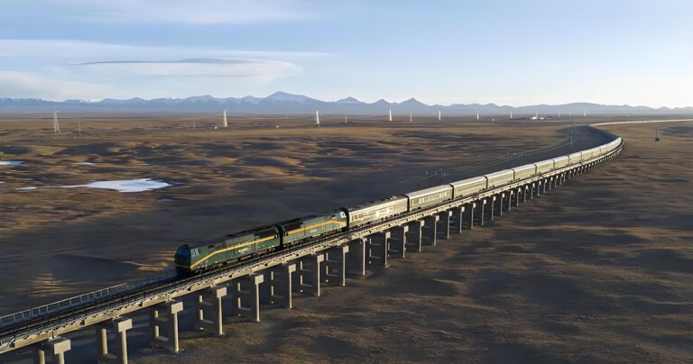Tibet train crossing a long viaduct on the plateau